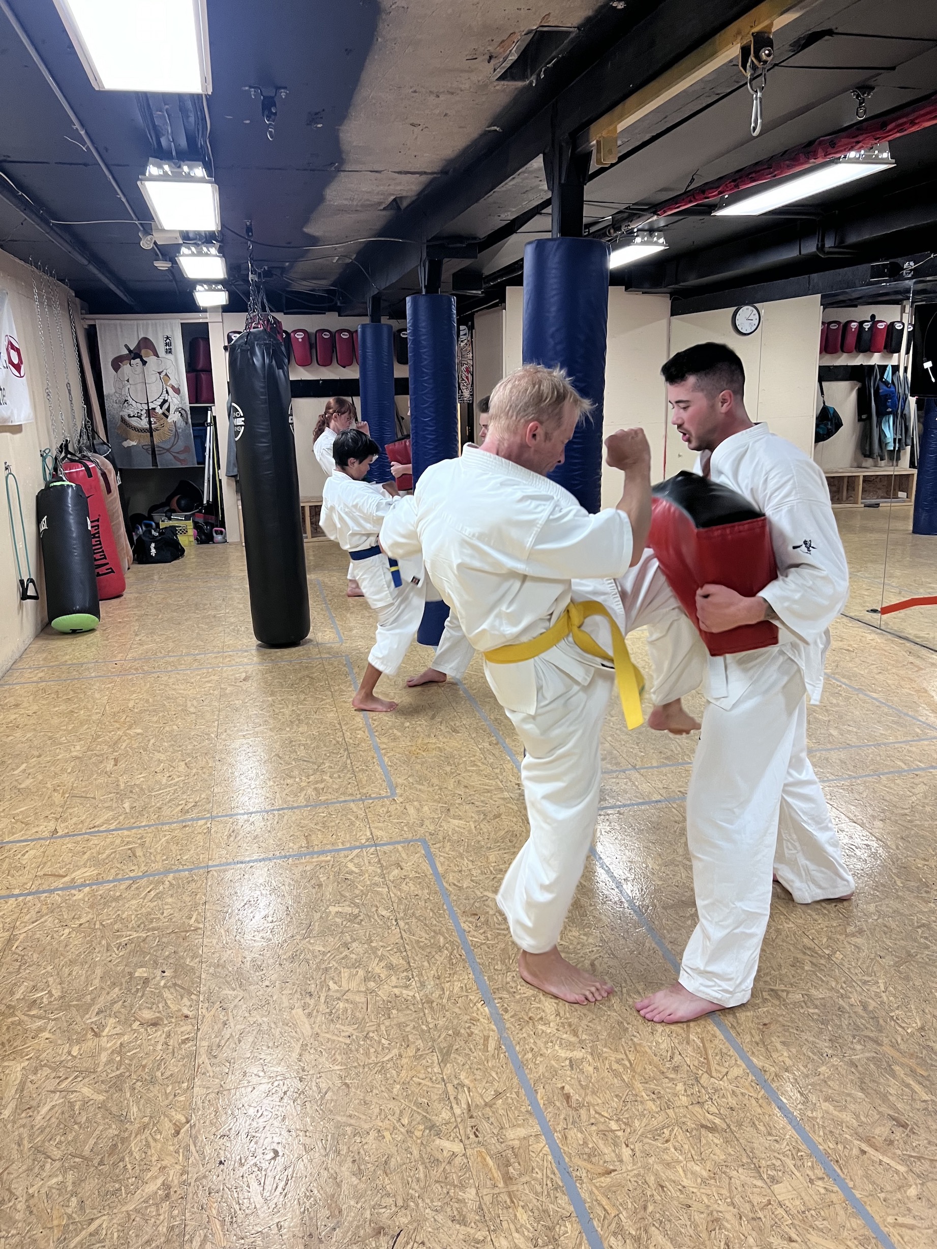 Teens and adults practising Kyokushin Karate in Banff