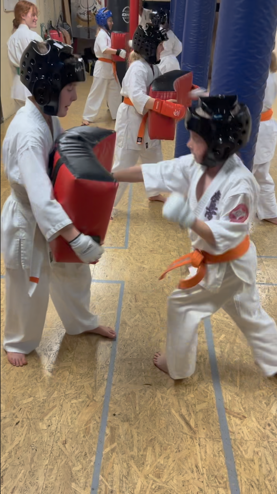 Senior kids practising contact training at Banff Kyokushin Karate